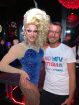 In the bar Rouge, Drag Queen Priscilla, Queen of Mykonos, urges to guests to participate in the NoHIVstigma campaign to dispel the fear of HIV.